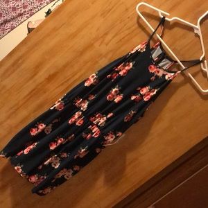 Navy romper with pink floral.